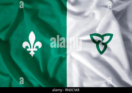 Franco-Ontarian stylish waving and closeup flag illustration. Perfect for background or texture purposes. Stock Photo