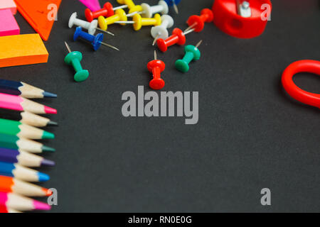 School supplies on dark background. top view Stock Photo
