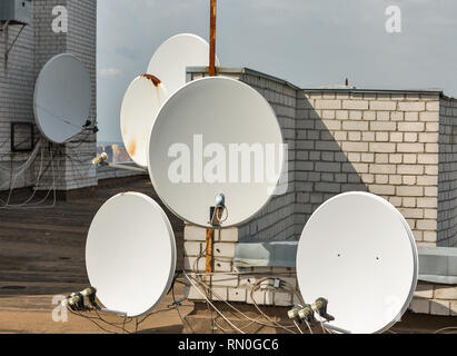 Many satellite dishes on a rooftop in Kiev, Ukraine. Stock Photo