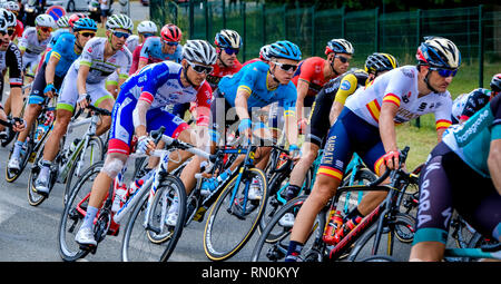 Tour de France 2018 - stage 8. The peloton passing through Marseille en Beauvaisis, France about 60 kilometres from the finish in Amiens Stock Photo