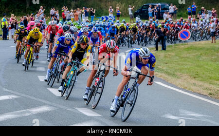 Tour de France 2018 - stage 8. The peloton passing through Marseille en Beauvaisis, France about 60 kilometres from the finish in Amiens Stock Photo