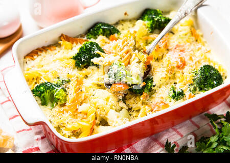 Casserole from pasta and vegetables in baking dish. Stock Photo
