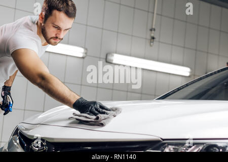 awesome man preparing his car for sale, business, close up photo. copy space. preparation fo trip Stock Photo