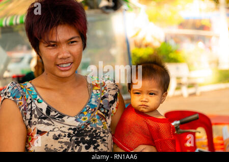 Young Cambodian mother and pre school age child smile for the camera  Kampong Tralach, Oudong, Cambodia, Asia Stock Photo