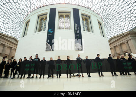 Activists are seen holding a banner during the protest. Hundreds of activists demonstrates inside The British Museum who was sponsoring the current exhibition “I am Ashurbanipal: king of the world, king of Assyria” which is featuring many ancient artefacts from what is now Iraq. By promoting BP, The British Museum is helping a major fossil fuel company and corporate criminal to cleanse its image, make new oil deals and hide its true activities. As the climate crisis unfolds and communities affected by fossil fuel extraction demand justice, it is no longer acceptable for museums and galleries t Stock Photo