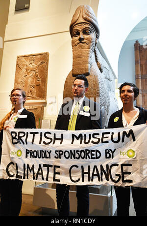 Activists from the pressure group BP or not BP protest inside the British Museum in London against BP's sponsorship of the exhibition I am Ashurbanipal: king of the world, king of Assyria. Stock Photo