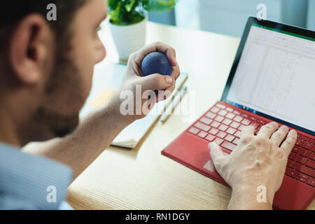 Adult Business Man Under Stress Pressure In Office Using Laptop Stock Photo