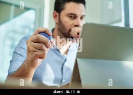 Adult Business Man Under Stress Pressure In Office Using Laptop Stock Photo