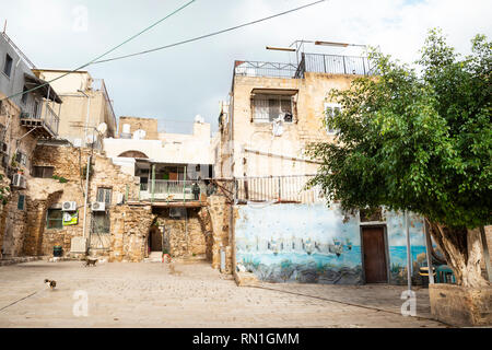 Old City of Acre, Israel - December 27, 2018: Exterior of Old neglected shabby house buildings in Old City of Acre (Akko) in Israel, Middle East. Stock Photo