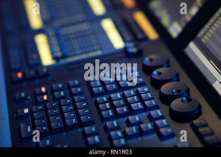 Moving light controller with LCD screens. Selective focus. Stock Photo