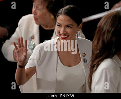 Washington DC, USA. 5th February 2019. United States Representative Alexandria Ocasio-Cortez (Democrat of New York) on the floor following United States President Donald J. Trump's second annual State of the Union Address to a joint session of the US Congress in the US Capitol in Washington, DC on Tuesday, February 5, 2019. Credit: Alex Edelman/CNP | usage worldwide Credit: dpa picture alliance/Alamy Live News Stock Photo