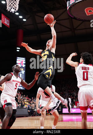 Piscataway, New Jersey, USA. 16th Feb, 2019. Iowa Hawkeyes guard CONNOR MCCAFFERY (30) drives to the basket against Rutgers in a game at the Rutgers Athletic Center. Credit: Joel Plummer/ZUMA Wire/Alamy Live News Stock Photo