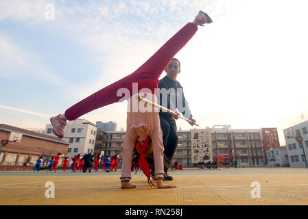 Taiyuan, Shanxi, China. 31st Dec, 2018. Students practice traditional Chinese exercises at the young communist school Everbright Elementary near Taiyuan, Shanxi Province, on December 31, 2018. China's Communist Party, led by President Xi Jinping, remains firmly in control of the government and in most aspects of Chinese culture, education and societal issues. Traditional Chinese exercises are promoted in most schools throughout China. Credit: Stephen Shaver/ZUMA Wire/Alamy Live News Stock Photo