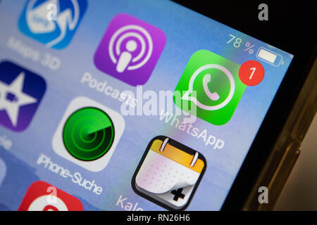 Stuttgart, Germany. 15th Feb, 2019. The logo of the Messenger app WhatsApp can be seen on the display of an iPhone. (to dpa 'Teachers in the country often do not adhere to the Whatsapp ban' of 17.02.2019) Credit: Fabian Sommer/dpa/Alamy Live News Stock Photo