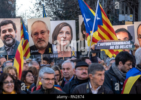 Barcelona, Spain. 16th Feb 2019. Portraits of political prisoners are seen among the protesters during the demonstration. Summoned by the main sovereign entities ANC and Òmnium 200,000 people demonstrate in Barcelona against the judicialization of demands for self-determination and independence in Catalonia. Credit: SOPA Images Limited/Alamy Live News Stock Photo
