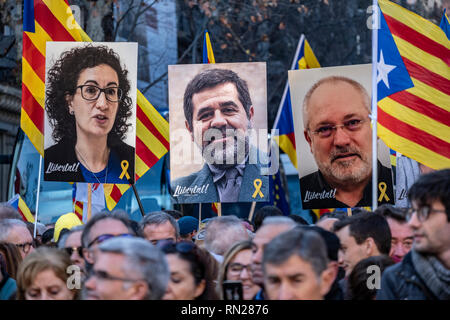 Barcelona, Spain. 16th Feb 2019. Portraits of political prisoners are seen among the protesters during the demonstration.  Summoned by the main sovereign entities ANC and Òmnium 200,000 people demonstrate in Barcelona against the judicialization of demands for self-determination and independence in Catalonia. Credit: SOPA Images Limited/Alamy Live News Stock Photo