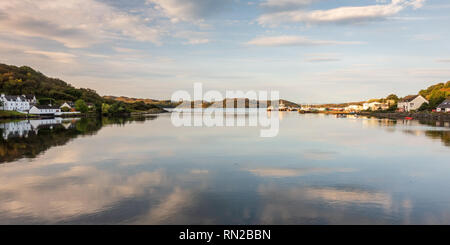 Gairloch, Scotland, UK - September 23, 2017: Cottages stand on the shores of Charlestown harbour, a fishing village near Gairloch in the remote northw Stock Photo