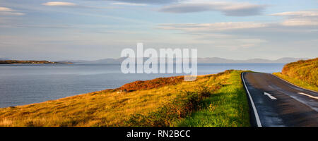The Trotternish mountains of the Isle of Skye rise from the Atlantic Ocean as viewed from Gairloch on the west coast of the Highlands of Scotland. Stock Photo