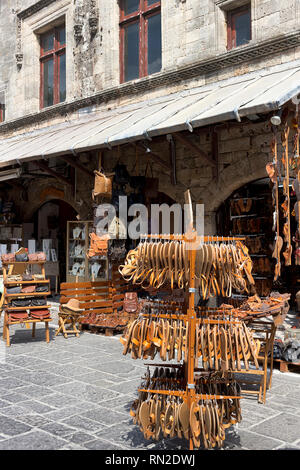 Rhodes island, Greece - September 12, 2018.  Handmade greek leather sandals and bags on display outside of a shop in a street of Rhodes Old City,  Dod Stock Photo