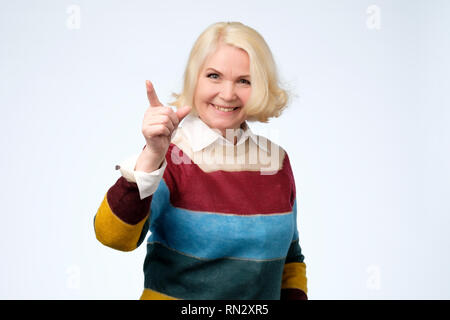 Cheerful senior woman pointing to you, You are the best. Stock Photo