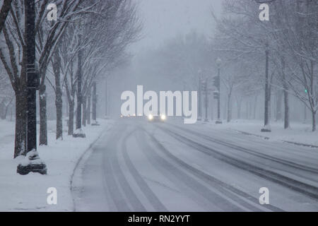 Car traffic on Independence Avenue in snow Washington DC USA Stock Photo