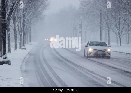 Car traffic on Independence Avenue in snow Washington DC USA Stock Photo