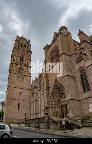 Rodez, France - June 2015: Facade of Red sandstone Rodez Notre-Dame Cathedral  in Aveyron department of Midi Pyrenees Stock Photo