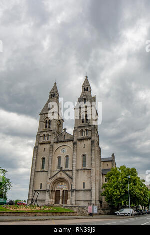 Rodez, France - June 2015: Facade of Church of the Sacred Heart in Rodez,  Aveyron department of Midi Pyrenees Stock Photo