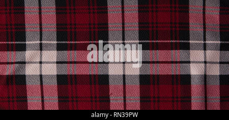 White and red cell fabric background. Checkered fabric close-up. Stock Photo