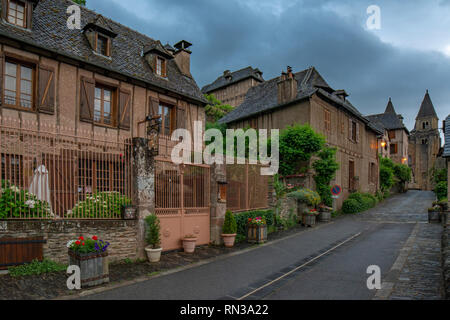 Conques, Midi Pyrenees, France - June , 2015: View of the medieval village of Conques and the Abbey Church of Saint Foy Stock Photo