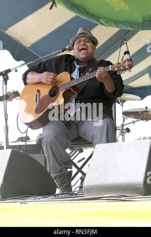 Singer, songwriter and guitarist Toshi Reagon is shown performing on stage during a 'live' concert appearance. Stock Photo