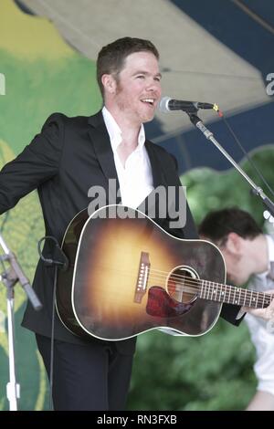 Singer, songwriter and guitarist Josh Ritter is shown performing on stage during a 'live' concert appearance. Stock Photo