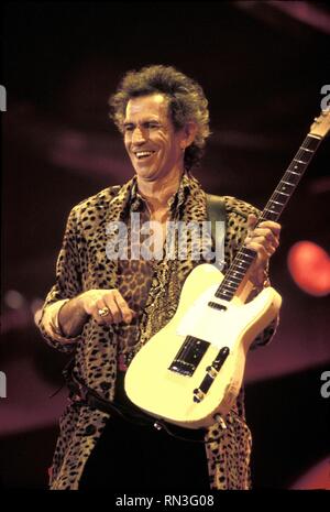 Guitarist Keith Richards of the Rolling Stones is shown performing on stage during a 'live' concert appearance. Stock Photo