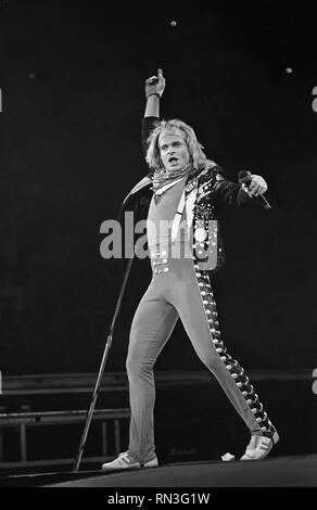 Singer David Lee Roth is shown performing on stage during a 