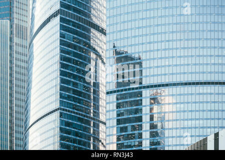 Architecture details Modern Building Glass and metal facade Business background. Abstract reflections Stock Photo