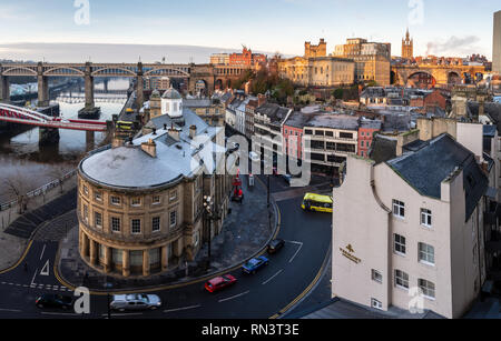 Newcastle, England, UK - February 2, 2019: Dawn light falls on the cityscape of Newcastle's old quayside neighbourhood, including the Guidhall and Moo Stock Photo