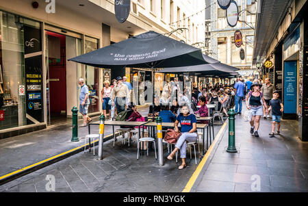 3rd January 2019, Melbourne Australia : Degraves pedestrian street view full of people on sunny summer day with people eating on outdoor tables in Mel Stock Photo