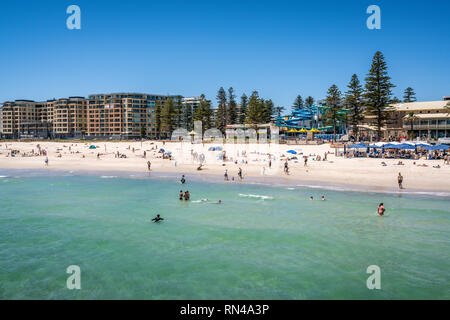 31st December 2018 , Glenelg Adelaide South Australia : View of Glenelg beach full of people in Adelaide suburb on hot sunny summer day in South Austr Stock Photo