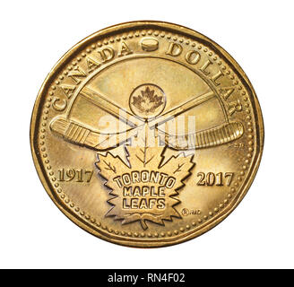 CANADA - 2017:  The Canadian mint issued this special dollar coin to commemorate the 100th anniversary of the Toronto Maple Leafs hockey team. Stock Photo