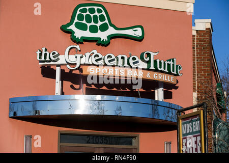 A logo sign outside of a The Green Turtle restaurant location in Dulles, Virginia on February 14, 2019. Stock Photo