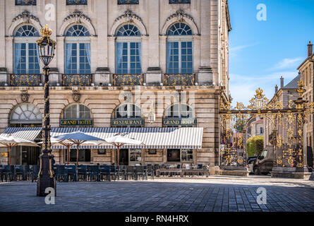 Elegant cafe and hotel with patio in famous French square, Stanislas Place in Nancy France. Stock Photo