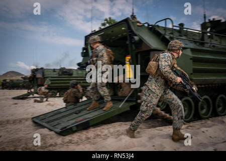 U.S. Marines conduct an amphibious assault exercise during exercise Cobra Gold at Hat Yao Beach, Sattahip, Kingdom of Thailand, Feb. 16, 2019. Cobra Gold demonstrates the commitment of the Kingdom of Thailand and the United States to our long-standing alliance, promotes regional partnerships and advances security cooperation in the Indo-Pacific region. The Marines are with Battalion Landing Team, 1st Battalion, 4th Marine Regiment. (U.S. Marine Corps photo by Staff Sgt. Matthew J. Bragg) Stock Photo