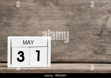 White block calendar present date 31 and month May on wood background Stock Photo