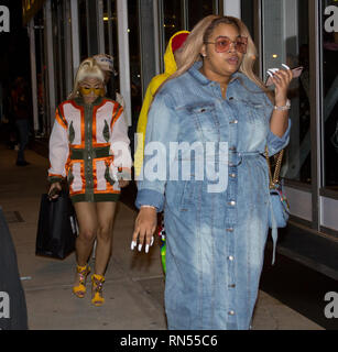 New York, USA. 8th February, 2019. Social media/television personality Hennessy Carolina Almánzar, younger sister of rapper Cardi B, walking into the Jeremy Scott Fall-Winter 2019 show at Spring Studios on February 8, Day 3 of New York Fashion Week Fall-Winter 2019. One of Us Weekly's Most Stylish New Yorkers 2018, Hennessy sported a blonde ponytail, purple nail polish, and yellow shades to match yellow strappy heels. Formerly on VH1's Love & Hip Hop New York and MTV's The Challenge: Champs vs. Stars, she walked with her head down among a group of three other people. Kay Howell/Alamy Live News Stock Photo
