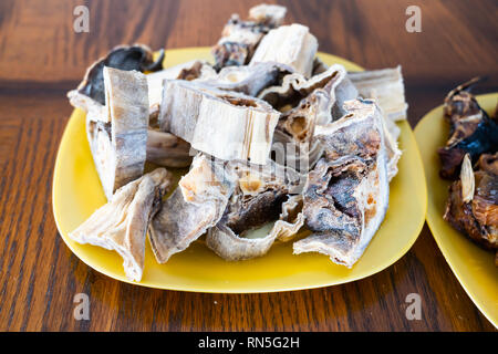 Pieces of Dried Nigerian Stockfish to prepare soups Stock Photo