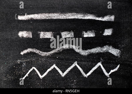 White chalk hand drawing in set of line shape on blackboard background Stock Photo