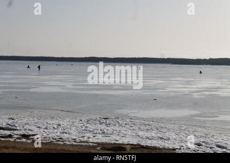 beautiful winter holiday on wild empty sea shore in cold but sunny day Stock Photo