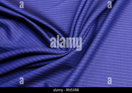 Wool fabric of dark blue color, costume fabric from wool 150 super Stock Photo