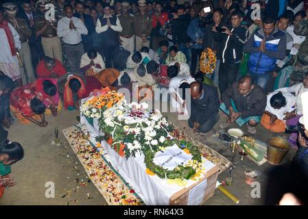 Assam, India. 16th Feb, 2019. Martyr Maneshwar Basumatary. Baksa, Assam, India. 16February 2019. Family members and relatives and others of slain Central Reserve Police Force (CRPF) soldier, Maneshwar Basumatary mourn near his coffin before his cremation ceremony at village Tamulpur in Baksa district, Assam, India, 16 February 2019. At least 44 Indian paramilitary Central Reserve Police Force personnel were killed and several injured when a Jaish-e-Mohammed militant rammed an explosive-laden vehicle into a CRPF convoy along the Srinagar-Jammu highway at Lethpora area in South Kashmir's Pulwama