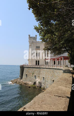 Miramare, TS, Italy - June 3, 2017: Miramare Caslte was built in 19th-century on the Gulf of Adriatic sea near Trieste City in northeastern Italy Stock Photo